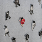 Aerial view of a woman of color among people of color
